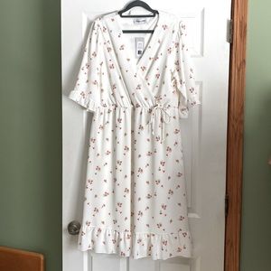 Floral dress, lined with pockets size L